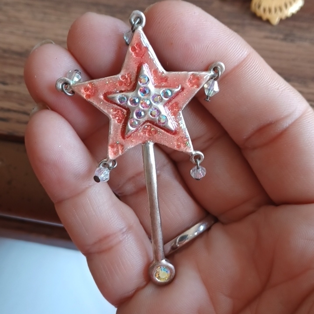 Star brooch. Silver-tone w red enamel and rhinestones, approx 2.5" - 3"